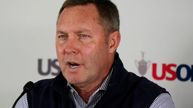 USGA's Mike Whan speaks during a news conference before the U.S. Open golf tournament at The Country Club, Wednesday, June 15, 2022, in Brookline, Mass. (AP Photo/Charlie Riedel)