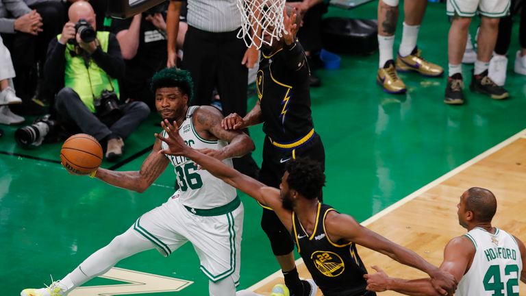 oston Celtics guard Marcus Smart (36) makes a pass against the Golden State Warriors during the second quarter of Game 3 of basketball&#39;s NBA Finals, Wednesday, June 8, 2022