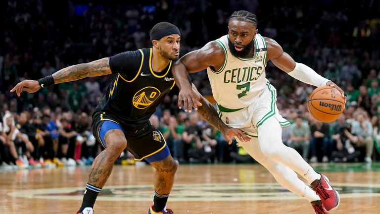 Boston Celtics guard Jaylen Brown (7) drives against Golden State Warriors guard Gary Payton II (0) during the first quarter of Game 3 of basketball&#39;s NBA Finals, Wednesday