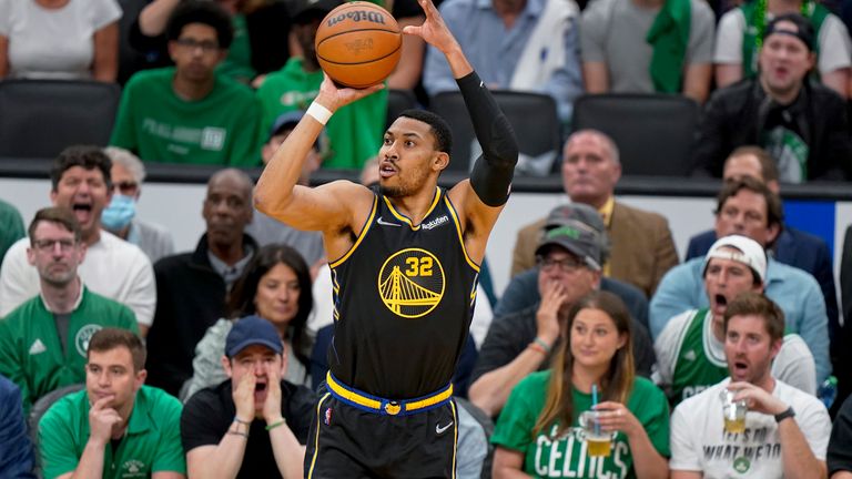 Golden State Warriors forward Otto Porter Jr. (32) puts up a shot against the Boston Celtics during the second quarter of Game 3 of basketball&#39;s NBA Finals, Wednesday, June 8, 2022, in Boston. (AP Photo/Steven Senne)