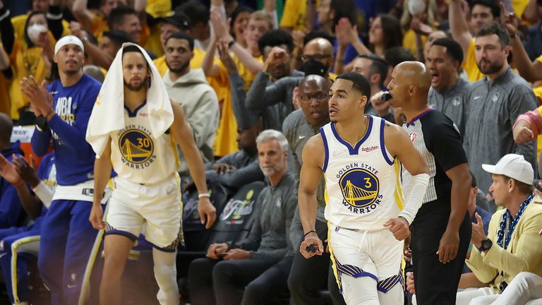 Golden State Warriors guard Jordan Poole (3) runs up the court after scoring against the Boston Celtics during the second half of Game 5 of basketball&#39;s NBA Finals in San Francisco, Monday, June 13, 2022.