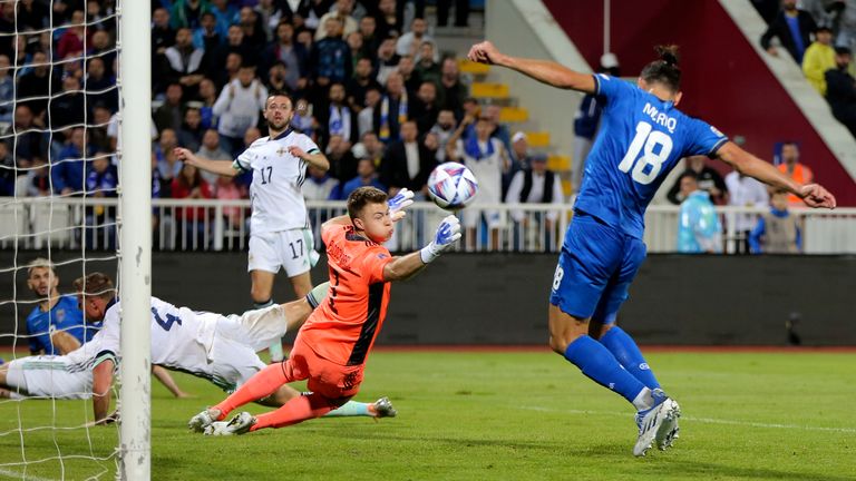 Kosovo&#39;s Vedat Muriqi, right, scores his side&#39;s third goal during the UEFA Nations League soccer match between Kosovo and Northern Ireland at Fadil Vokrri stadium in Pristina, Kosovo, Thursday, June 9, 2022. (AP Photo/Visar Kryeziu)