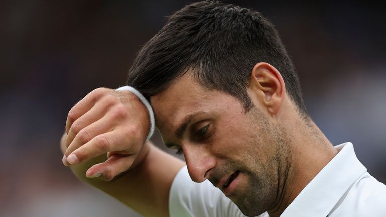 Novak Djokovic of Serbia reacts during gentlemen&#39;s singles first round match against Soonwoo Kwon of Korea in the Championships, Wimbledon at All England Lawn Tennis and Croquet Club in London, United Kingdom on June 27, 2022. ( The Yomiuri Shimbun via AP Images )