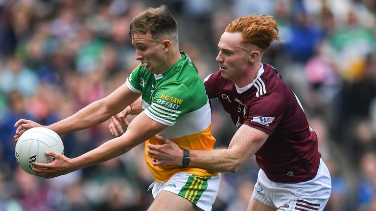 19 June 2022; Keith O'Neill of Offaly being tackled Ronan Wallace of Westmeath as he is on his way to scoring his side's first goal during the Tailteann Cup Semi-Final match between Westmeath and Offaly at Croke Park in Dublin. Photo by George Tewkesbury/Sportsfile