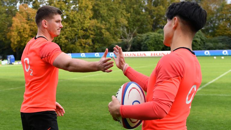 Owen Farrell of England high fives Marcus Smith of England after kicking together during a training session at Pennyhill Park on November 09, 2021 in Bagshot, England. (Photo by Dan Mullan - RFU/The RFU Collection via Getty Images)