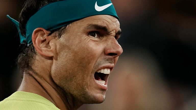 Spain's Rafael Nadal reacts after missing a point as he plays Serbia's Novak Djokovic during their quarterfinal match of the French Open tennis tournament at the Roland Garros stadium Tuesday, May 31, 2022 in Paris. (AP Photo/Thibault Camus)