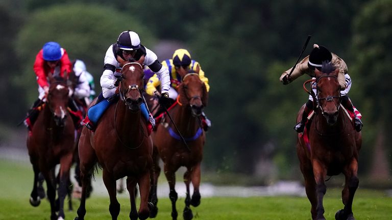 Rebel Territory, ridden by Jim Crowley, comes home to win The Coral Whitsun Cup Handicap at Sandown