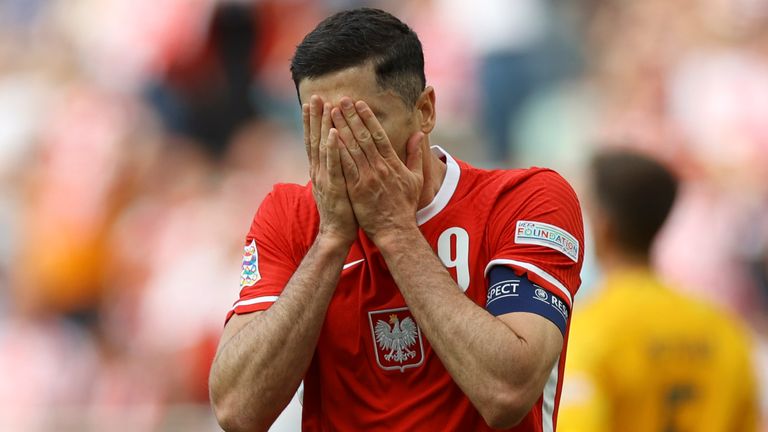 Robert Lewandowski reacts after a missed chance 