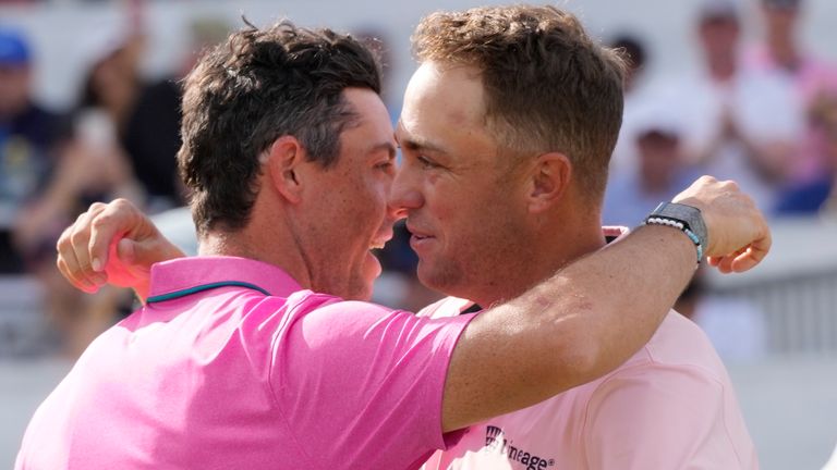 Thomas hugs McIlroy after the Northern Irishman won the Canadian Open