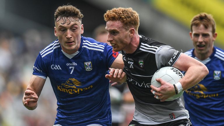 19 June 2022; Seán Carrabine of Sligo in action against Conor Brady of Cavan during the Tailteann Cup Semi-Final match between Sligo and Cavan at Croke Park in Dublin. Photo by George Tewkesbury/Sportsfile