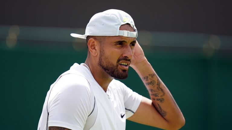 Nick Kyrgios has admitted spitting in the direction of an abusive fan during his Wimbledon first round win and questioned a line judge he described as &#39;an old man&#39;.