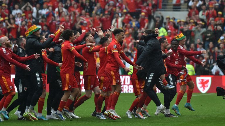 Welsh players celebrate the World Cup