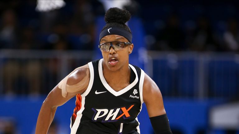 Phoenix Mercury guard Diamond DeShields brings the ball up court during a WNBA game.