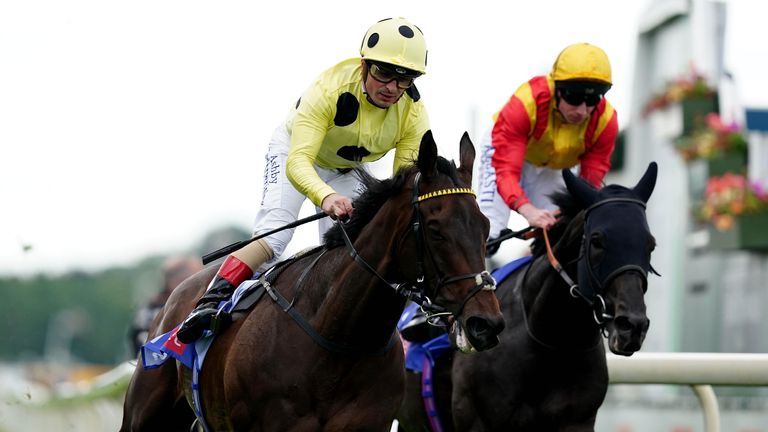 Without A Fight (left) ridden by jockey Andrea Atzeni on their way to winning the Sky Bet Race To The Ebor Grand Cup Stakes during the June Meeting at York Racecourse. Picture date: Saturday June 11, 2022.