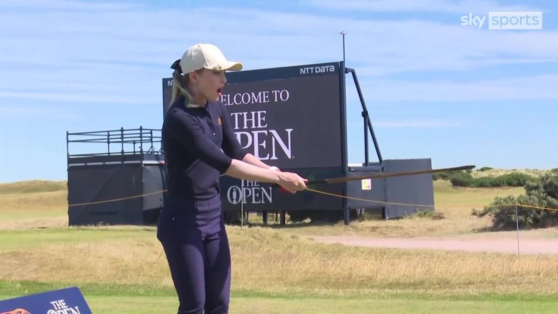 Actress snaps vintage golf club at The Open