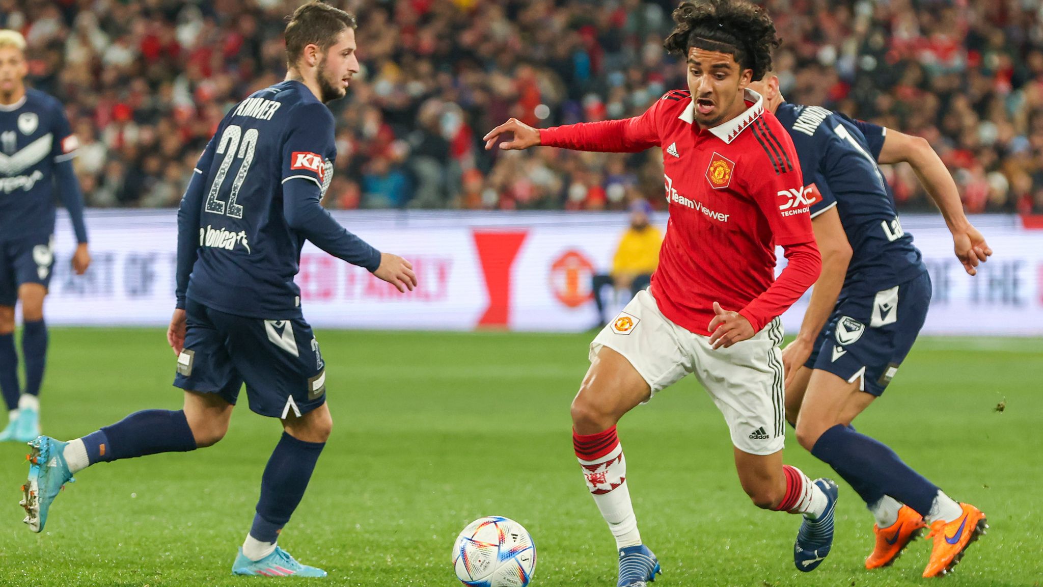 Manchester United&apos;s Zidane Iqbal competes for possession of the ball (...