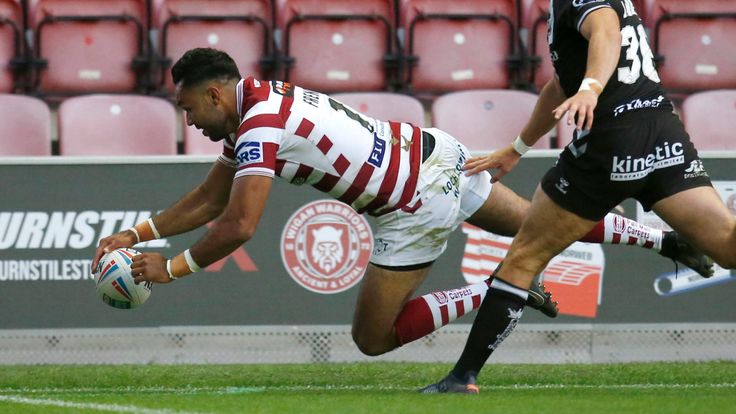 Picture by Ed Sykes/SWpix.com - 15/07/2022 - Rugby League - Betfred Super League Round 19 - Wigan Warriors v Hull FC - DW Stadium, Wigan, England - Wigan Warriors' Bevan French scores their eighth try and his sixth of the game