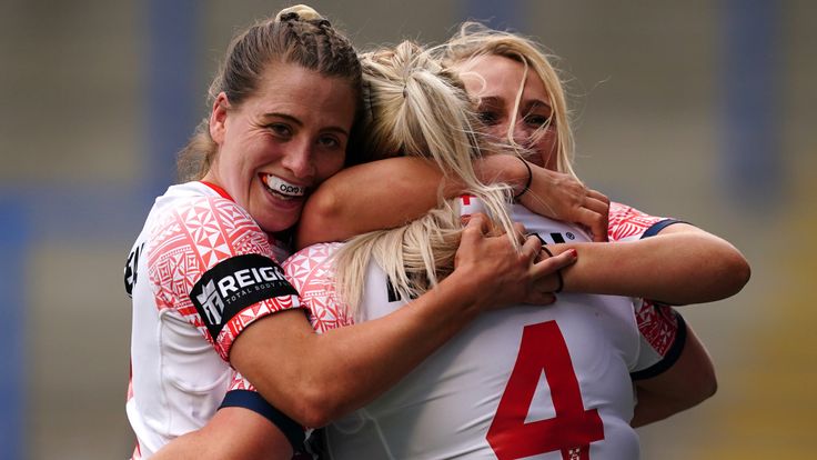 England v France - Women's International - Halliwell Jones Stadium
England�s Amy Hardcastle celebrates scoring her sides second try with Jodie Cunningham and Tara Jones during the Women's International match at the Halliwell Jones Stadium, Warrington. Picture date: Saturday June 18, 2022.