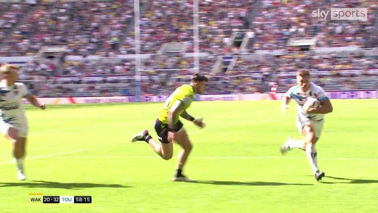 Toulouse Olympique's Matty Russell scores his second try of the game to put his team comfortably ahead of Wakefield Trinity.