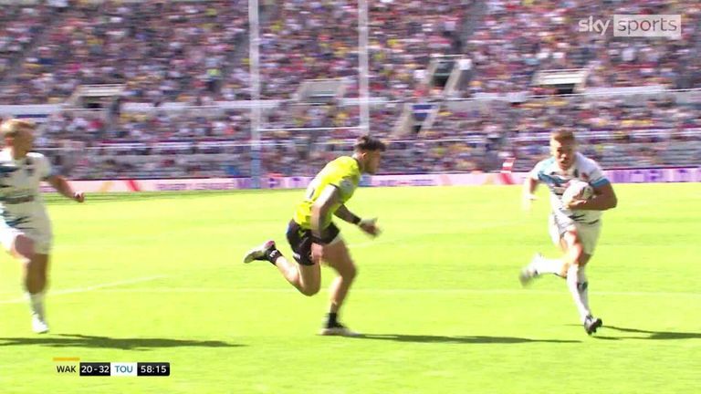 Toulouse's Matty Russell scores his second try of the game to put his team comfortably ahead of Wakefield Trinity.