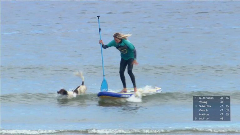 A paddleboarder and passenger watched events at The Open from the North Sea, before a slight mishap...