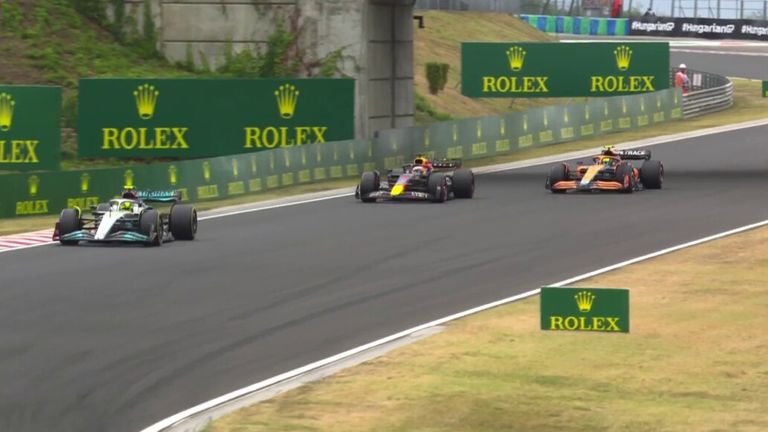 Lewis Hamilton and Max Verstappen overtake Lando Norris on lap 12.