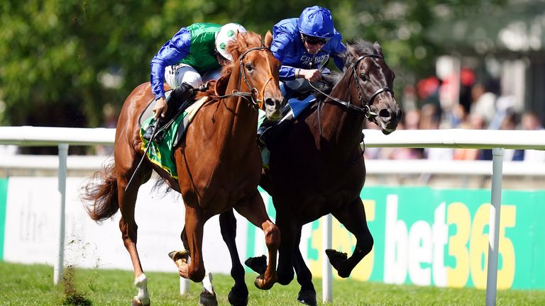 Isaac Shelby ridden by jockey Sean Levey (left) on their way to winning the bet365 Superlative Stakes ahead of Victory Dance and William Buick (right) on Darley July Cup Day of the Moet and Chandon July Festival at Newmarket racecourse, Suffolk. Picture date: Saturday July 9, 2022.