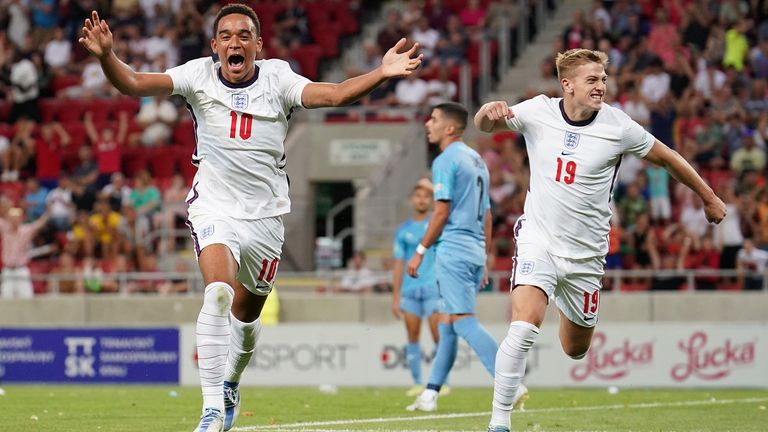 Aaron Ramsey (L) and Liam Delap celebrate after Carney Chukwuemeka puts England U19 ahead in extra-time