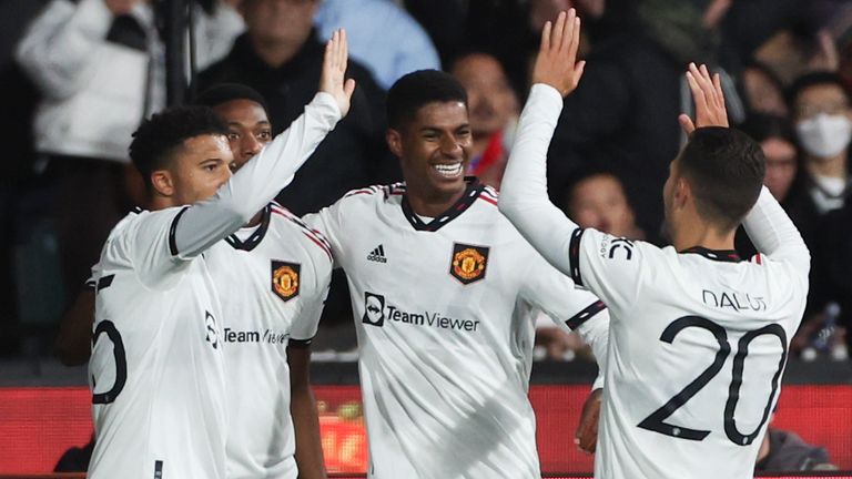 Anthony Martial (second left) celebrates with team-mates after scoring Man Utd's first (AP)