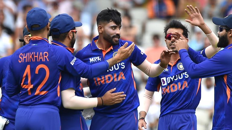 India's Mohammad Siraj, centre, celebrates with team mates after dismissing England's Jonny Bairstow during the third one day international cricket match between England and India at Emirates Old Trafford cricket ground in Manchester, England, Sunday, July 17, 2022. (AP Photo/Rui Vieira)