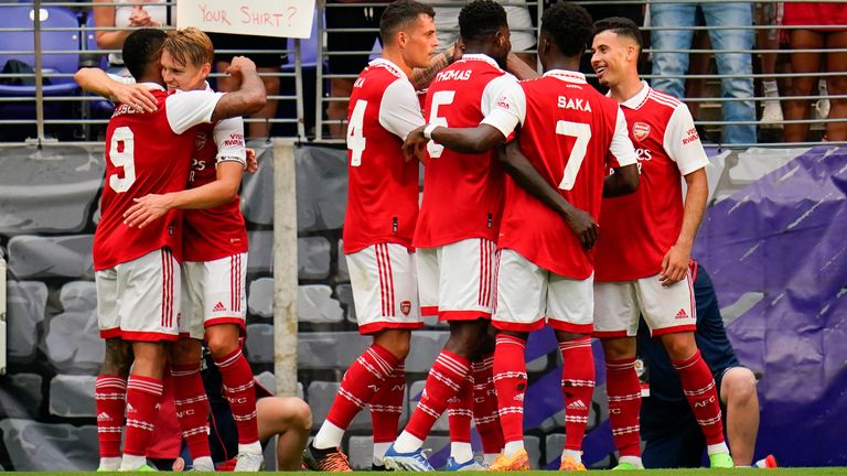 Arsenal players celebrate after Gabriel Jesus (9) scored a goal against Everton during the first half of a pre-season friendly soccer match, Saturday, July 16, 2022, in Baltimore. (AP Photo/Julio Cortez)