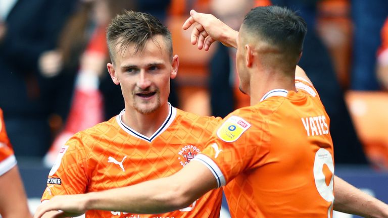Callum Connolly celebrates after opening the scoring for Blackpool
