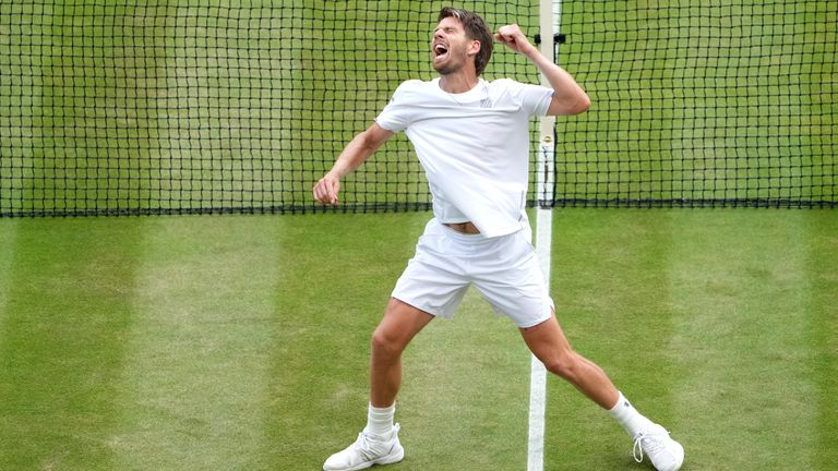 Cameron Norrie celebrates winning his Gentlemen's Singles fourth round match against Tommy Paul on court 1 during day seven of the 2022 Wimbledon Championships at the All England Lawn Tennis and Croquet Club, Wimbledon. Picture date: Sunday July 3, 2022.
