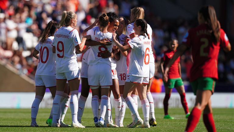 Coumba Sow is congratulated after opening the scoring for Switzerland