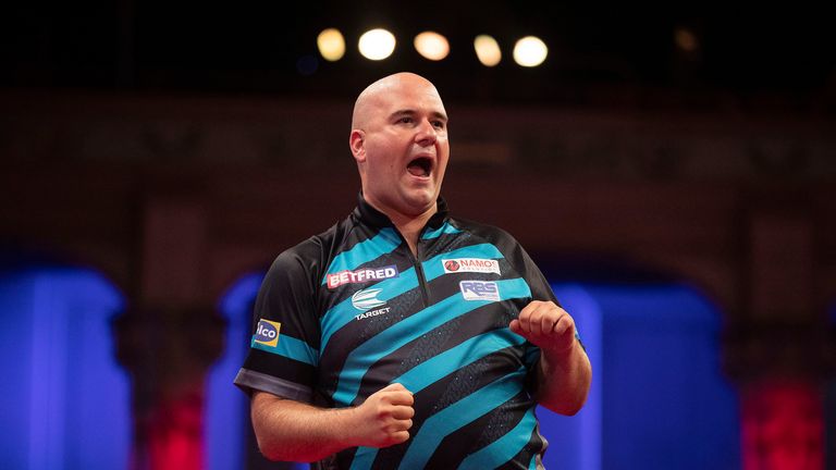 Rob Cross celebrates against Chris Dobey on Day 3 of the World Matchplay