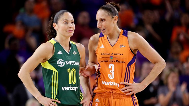 Phoenix Mercury guard Diana Taurasi, right, talks with Seattle Storm guard Sue Bird during the second half of a single-game WNBA basketball playoff matchup, in Tempe, Ariz. Bird and Taurasi headline the 29 players chosen for the U.S. women's basketball team pool. Eleven members of the 2016 Olympic team that won a sixth consecutive gold medal for the Americans are in the pool that was announced Thursday, Dec. 14. (AP Photo/Matt York, File)