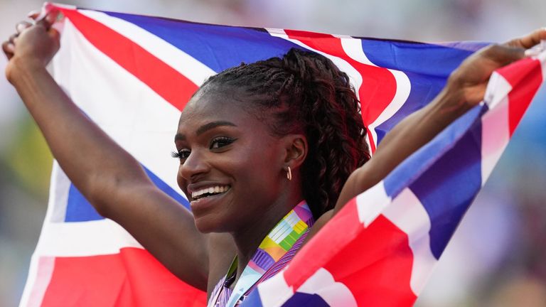 Dina Asher-Smith of Great Britain celebrates after the 200 m final at the World Athletics Championships.  (Photo: Martin Rickett / PA Wire / PA Images)