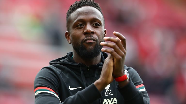 Former Liverpool striker Divock Origi has completed his free transfer to AC Milan on a four-year deal