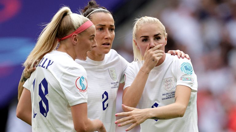 Image of Chloe Kelly, Lucy Bronze and Alex Greenwood in the Euro 2022 final