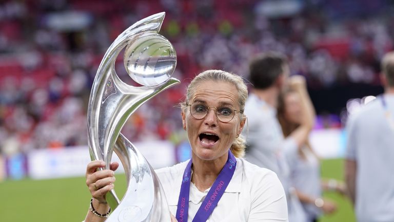 England head coach Sarina Wiegman celebrates with the trophy after the UEFA Women's Euro 2022 final at Wembley Stadium, London.  Date taken: Sunday, July 31, 2022.