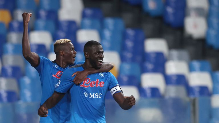 Napoli&#39;s Kalidou Koulibaly celebrates with teammate Victor Osimhen after scoring his side&#39;s second and decisive goal during the Italian Serie A soccer match between Napoli and Juventus at the Diego Maradona stadium in Naples, Italy, Saturday, Sept. 11, 2021. (Alessandro Garofalo/LaPresse via AP)