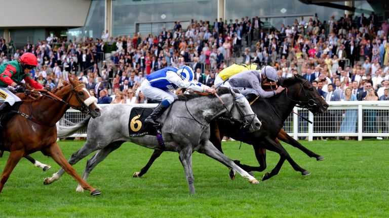 Fresh (grey silks) pokes his head in front to win the International Stakes at Ascot