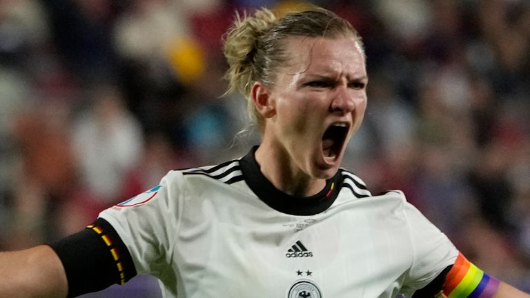Germany's Alexandra Popp celebrates after scoring her side's second goal during the Women Euro 2022 quarter final soccer match between Germany and Austria at Brentford Community Stadium in London, Thursday, July 21, 2022. (AP Photo/Alessandra Tarantino)