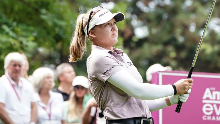 Brooke Henderson, of Canada, follows her ball after playing on the 2nd hole during the Evian Championship women&#39;s golf tournament in Evian, eastern France, Saturday, July 23, 2022.