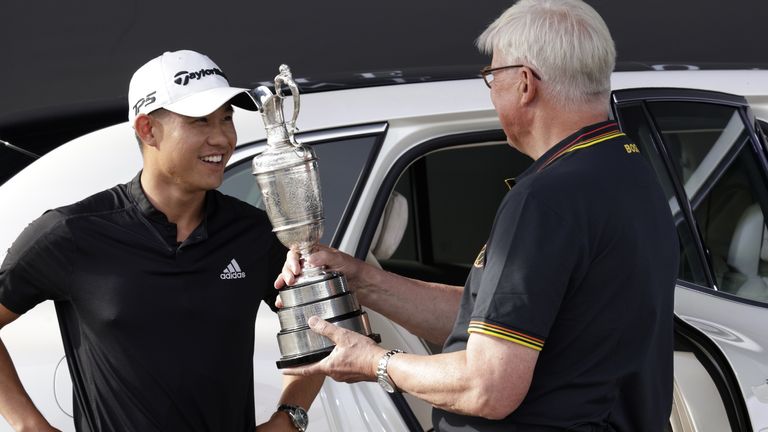 Collin Morikawa returned the Claret Jug to R&A Chief Executive Martin Slumbers on Monday 