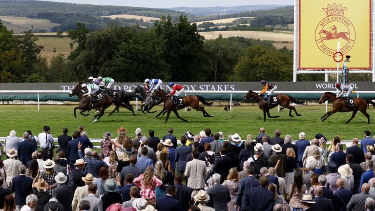 Sandrine (green and white, near side) wins the Lennox Stakes at Goodwood