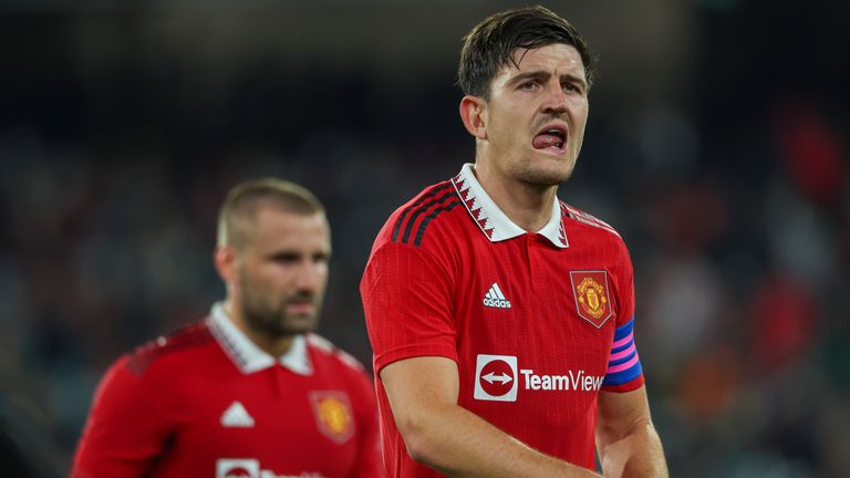 Manchester United&#39;s Harry Maguire reacts as he leaves the pitch at half time (AP)