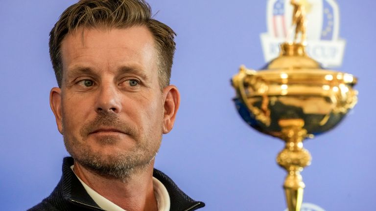 2023 Europe Ryder Cup golf captain Henrik Stenson looks at the Ryder Cup Trophy during a press conference at the Marco Simone golf club, in Guidonia Montecelio, outskirts of Rome (AP)