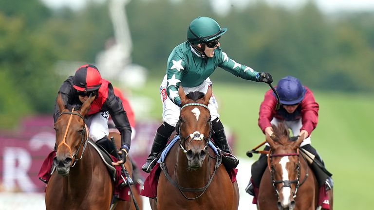 Hollie Doyle punches the air as Nashwa wins the Nassau Stakes at Goodwood