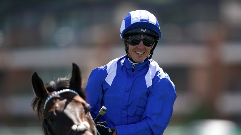 Jim Crowley grins after Minzaal's victory at Newbury